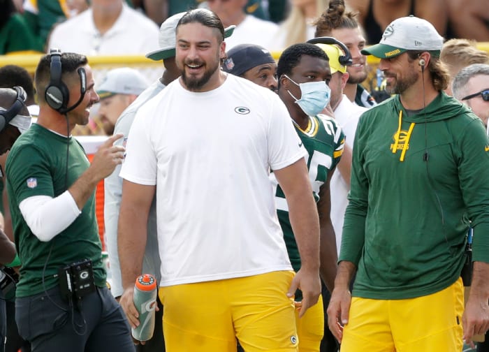 David Bakhtiari (l) and Aaron Rodgers (r)